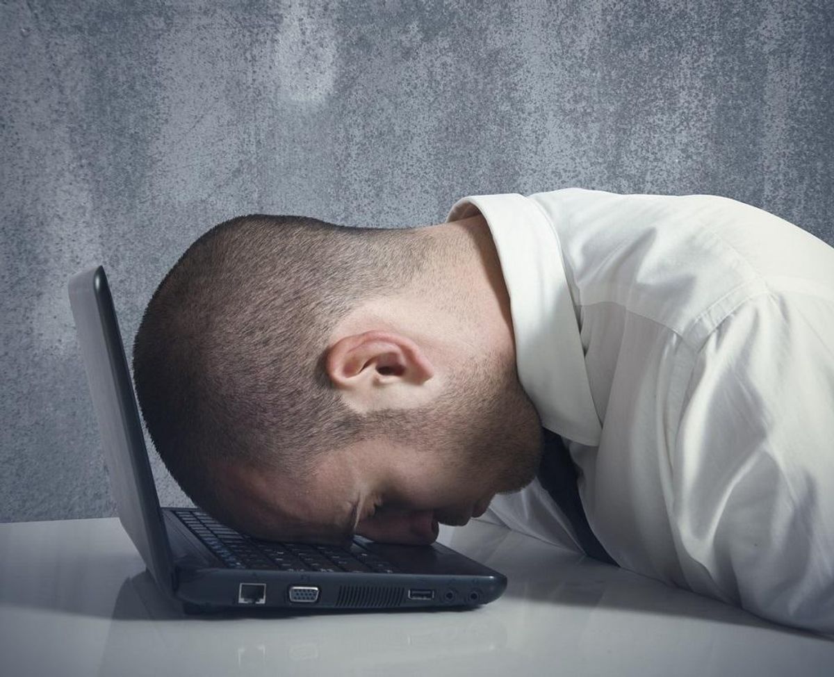 Concept of stressed busibnessman at work