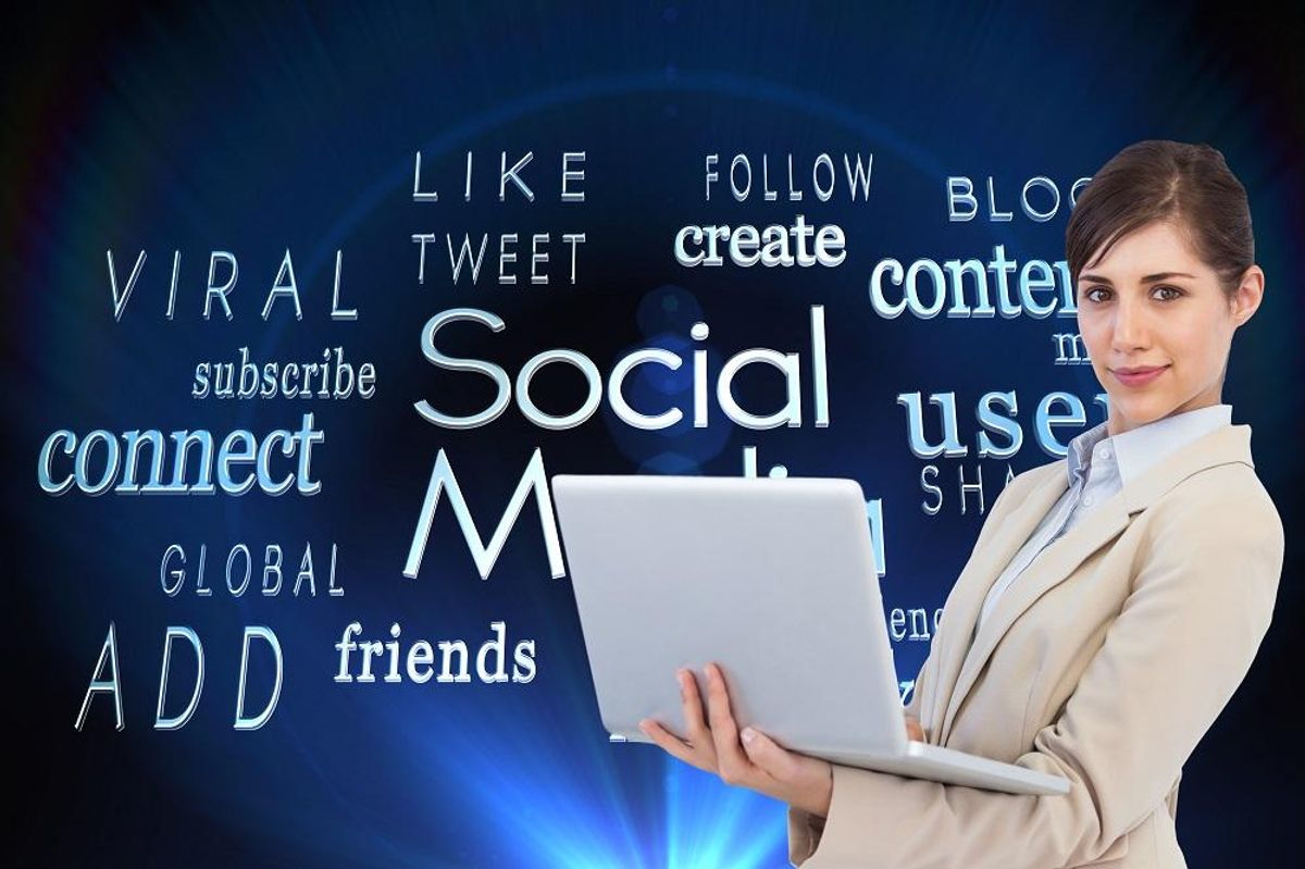 confident young businesswoman with laptop