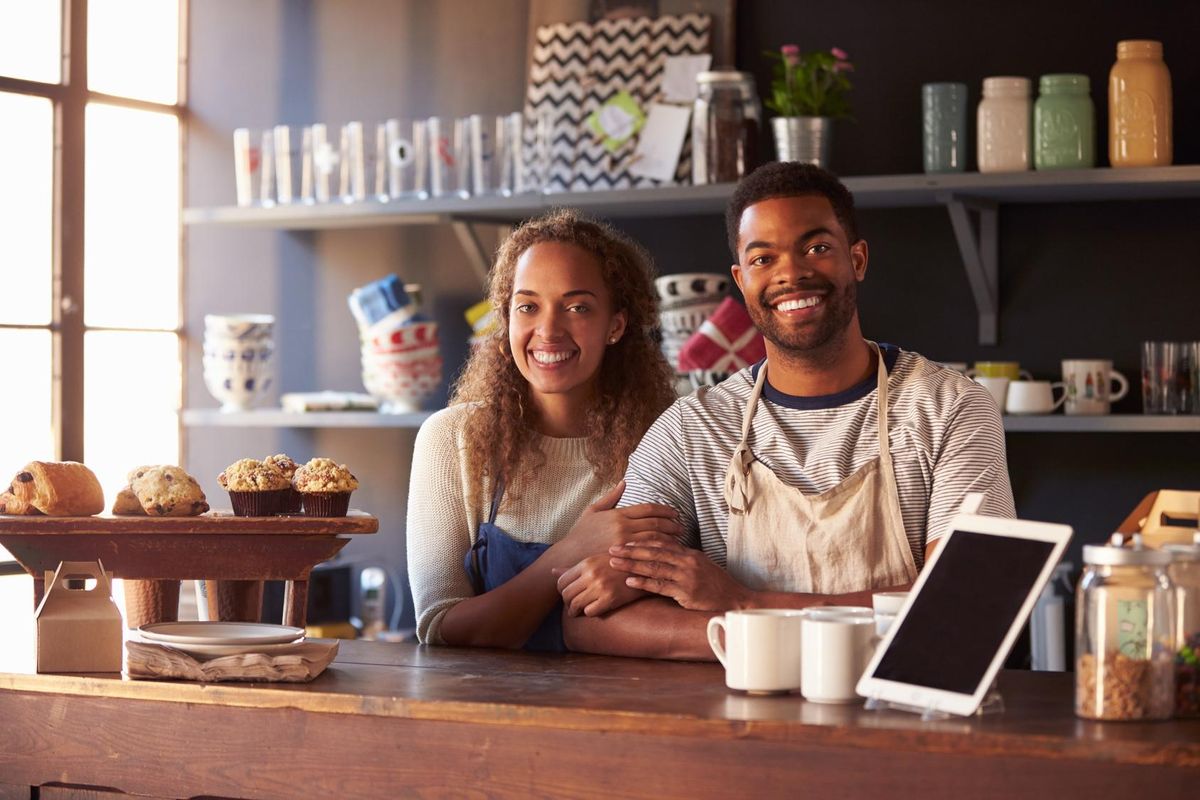 Couple Running Coffee Shop