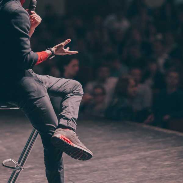 Doing a public speaking engagement to become recognized as an industry expert