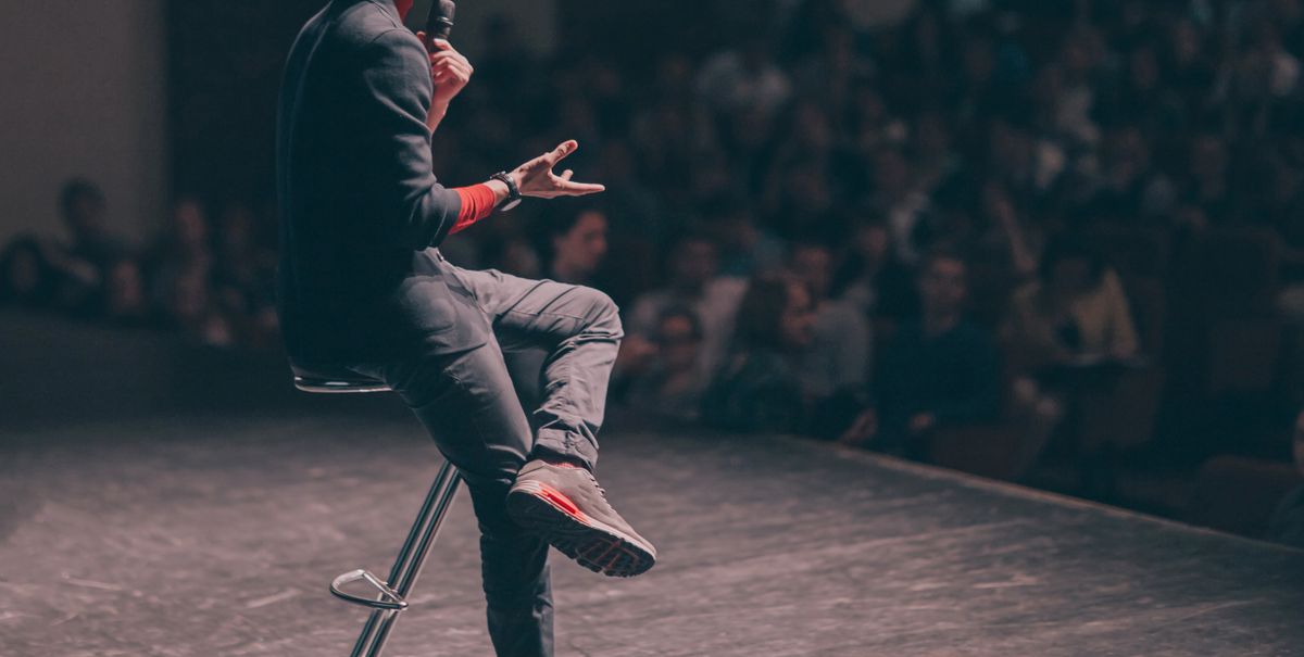 Doing a public speaking engagement to land new clients for business