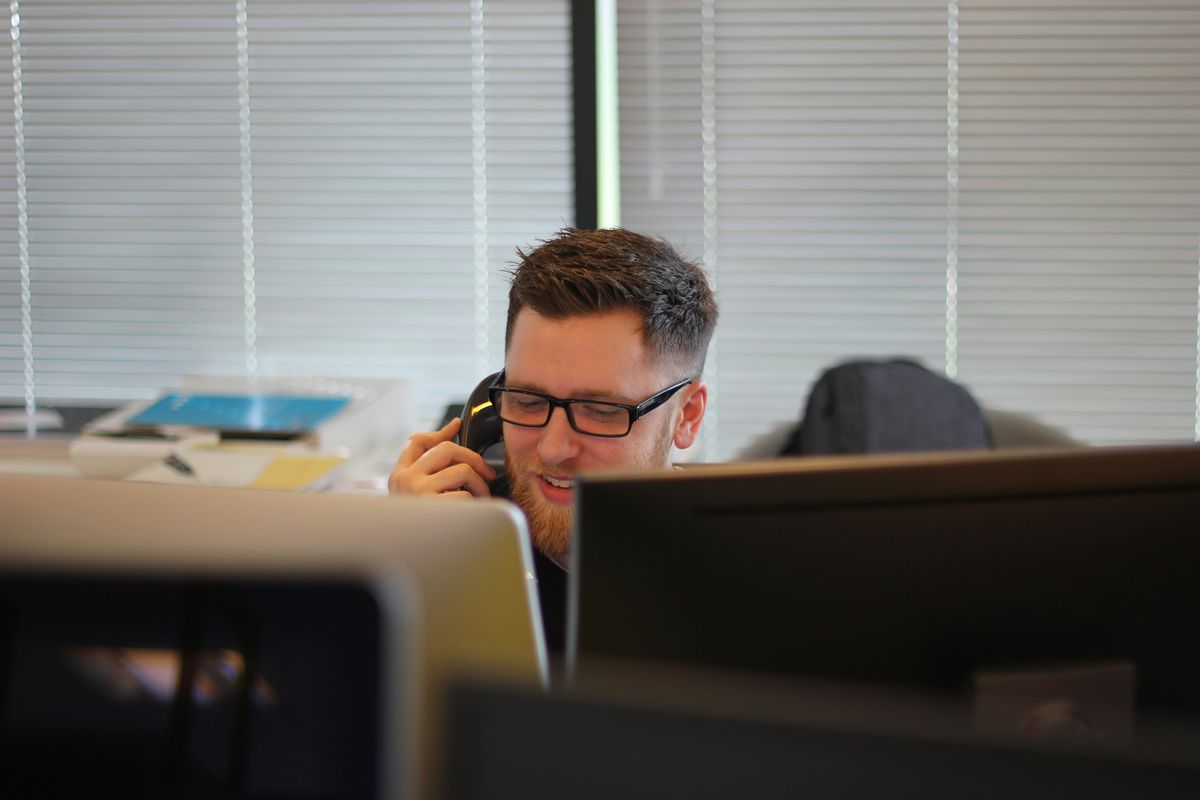 Doing a telephone survey as part of market research 