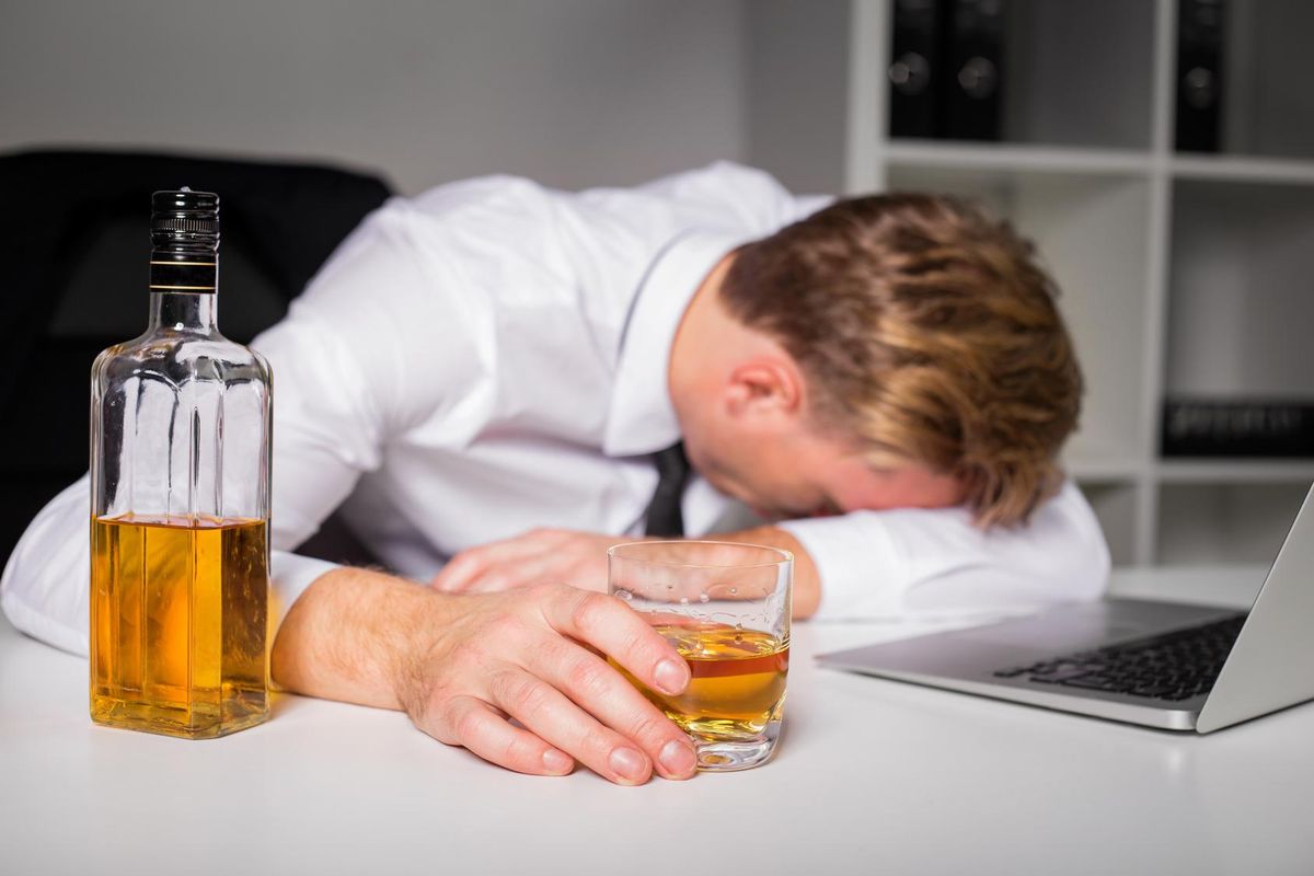 Drunk man at the office