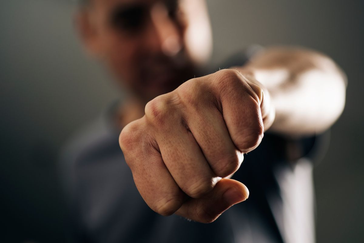 Employee being violent by throwing a punch in the workplace