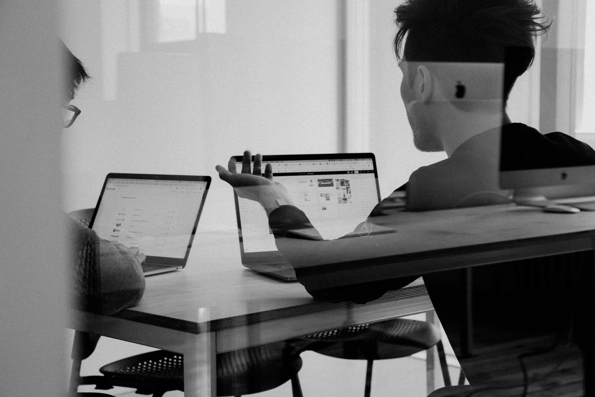 Employees at a service-based business talk growth