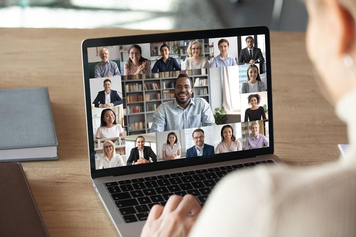 Employees on a video call dealing with Zoom fatigue