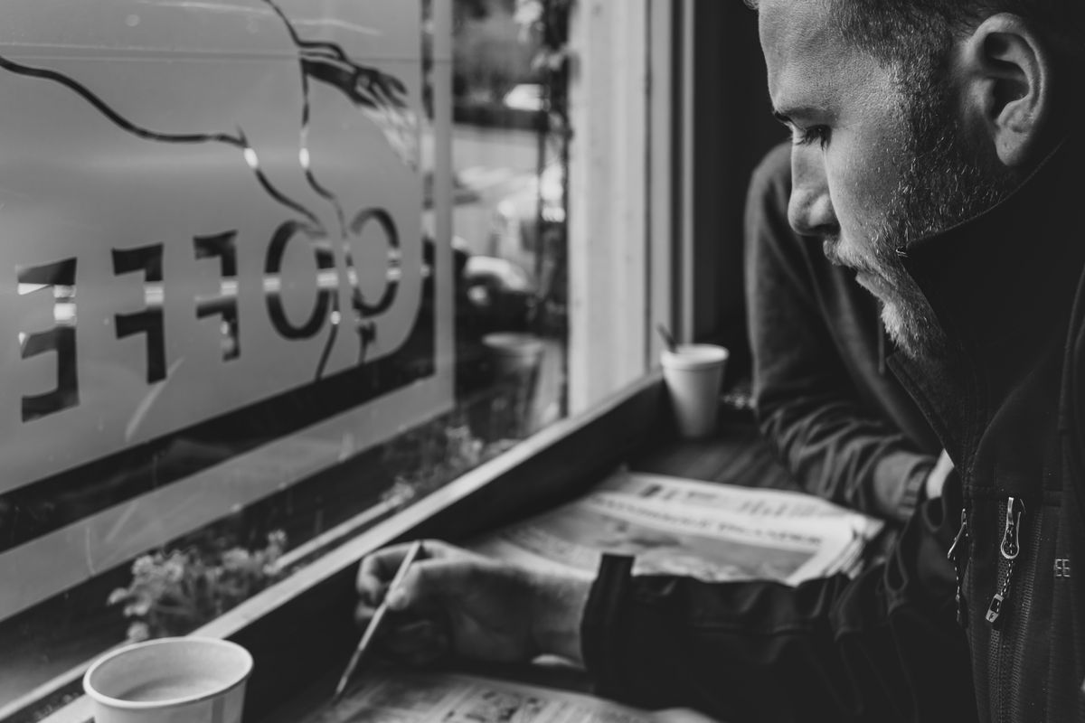 Entrepreneur doing word games to improve his leadership skills
