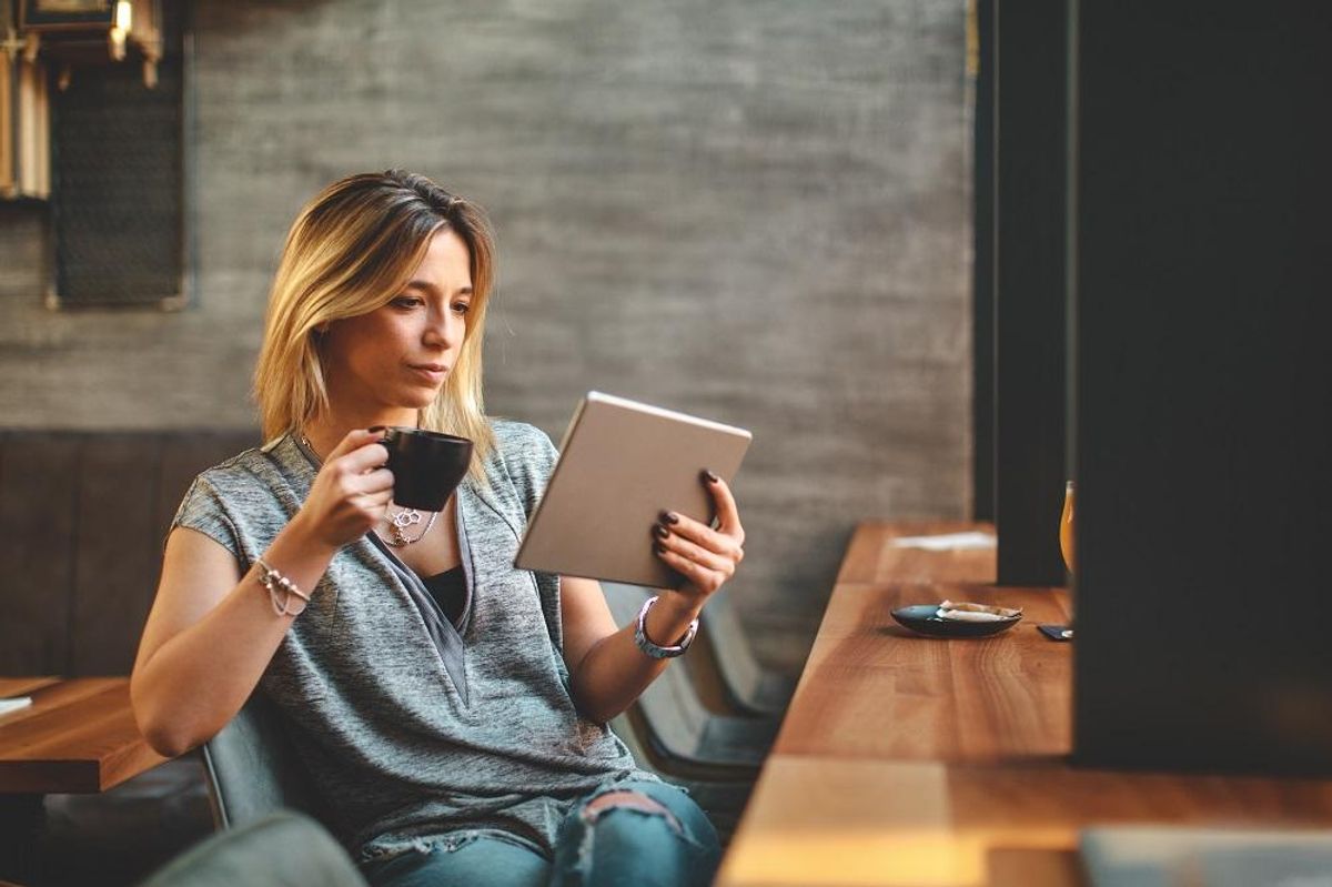 Entrepreneur reading a book on business