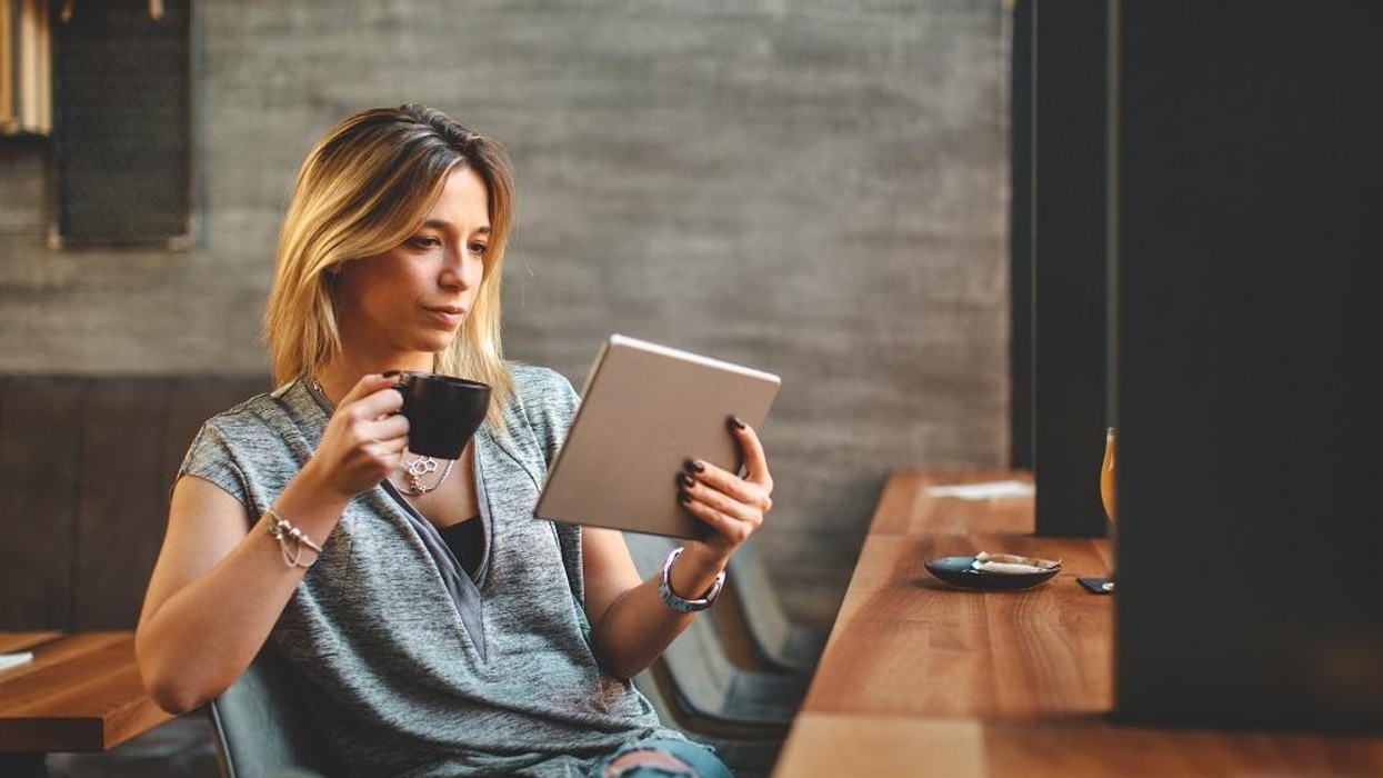 Entrepreneur reading a book on business