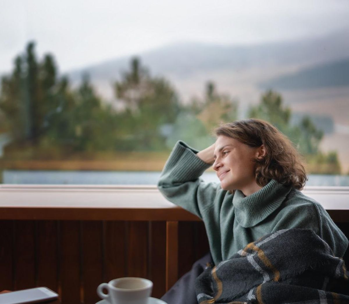 Entrepreneur taking a break from her business in the mountains