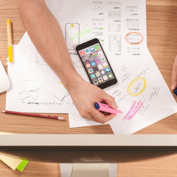 Entrepreneur writing a business plan before starting a business
