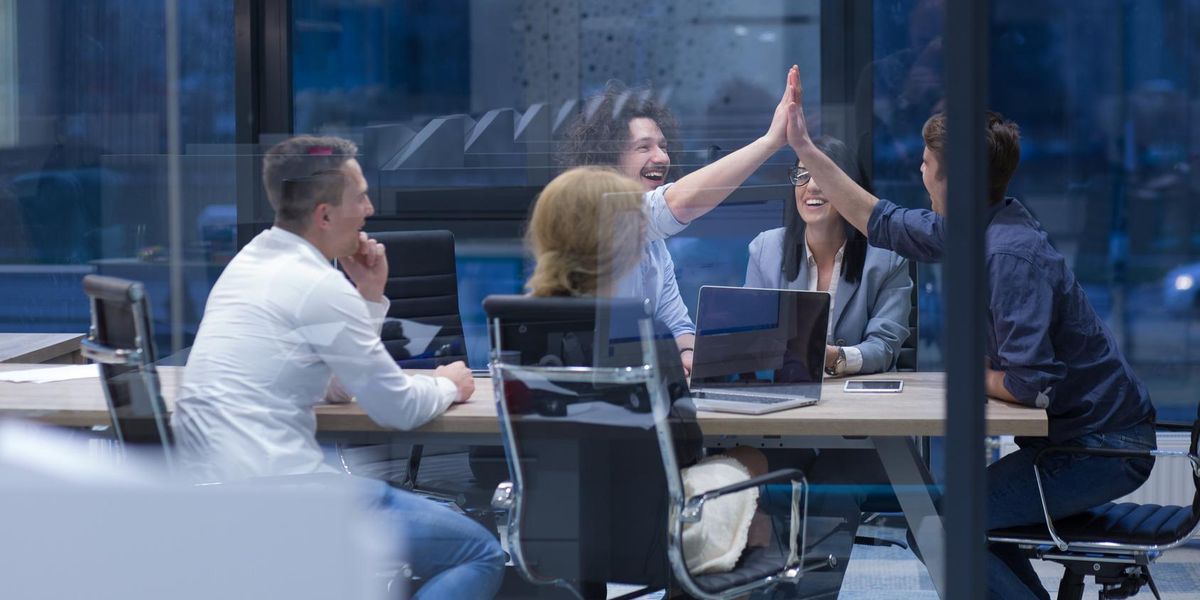 Entrepreneurs celebrating successes to minimize impostor syndrome