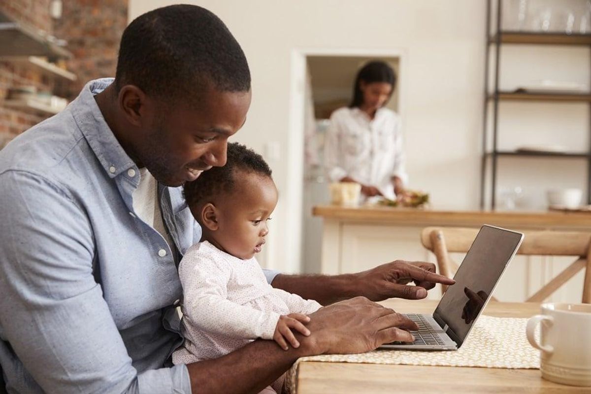 Father on parental leave And Baby Daughter