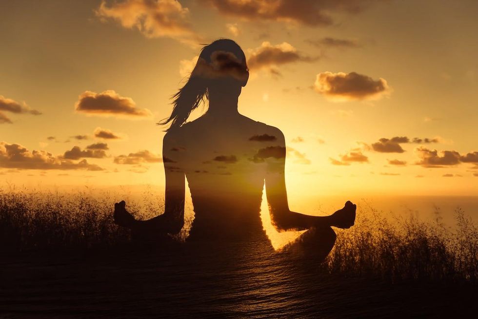 Female business owner incorporating spiritual meditation in her business