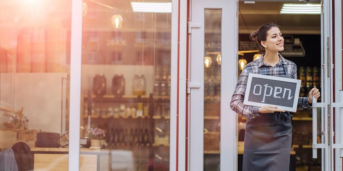 Female business owner with a brick-and-mortar business affected by inflation