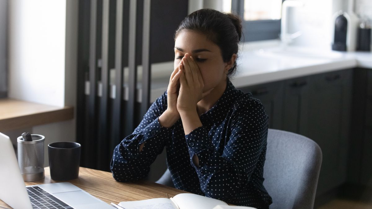 Female employee experiencing burnout
