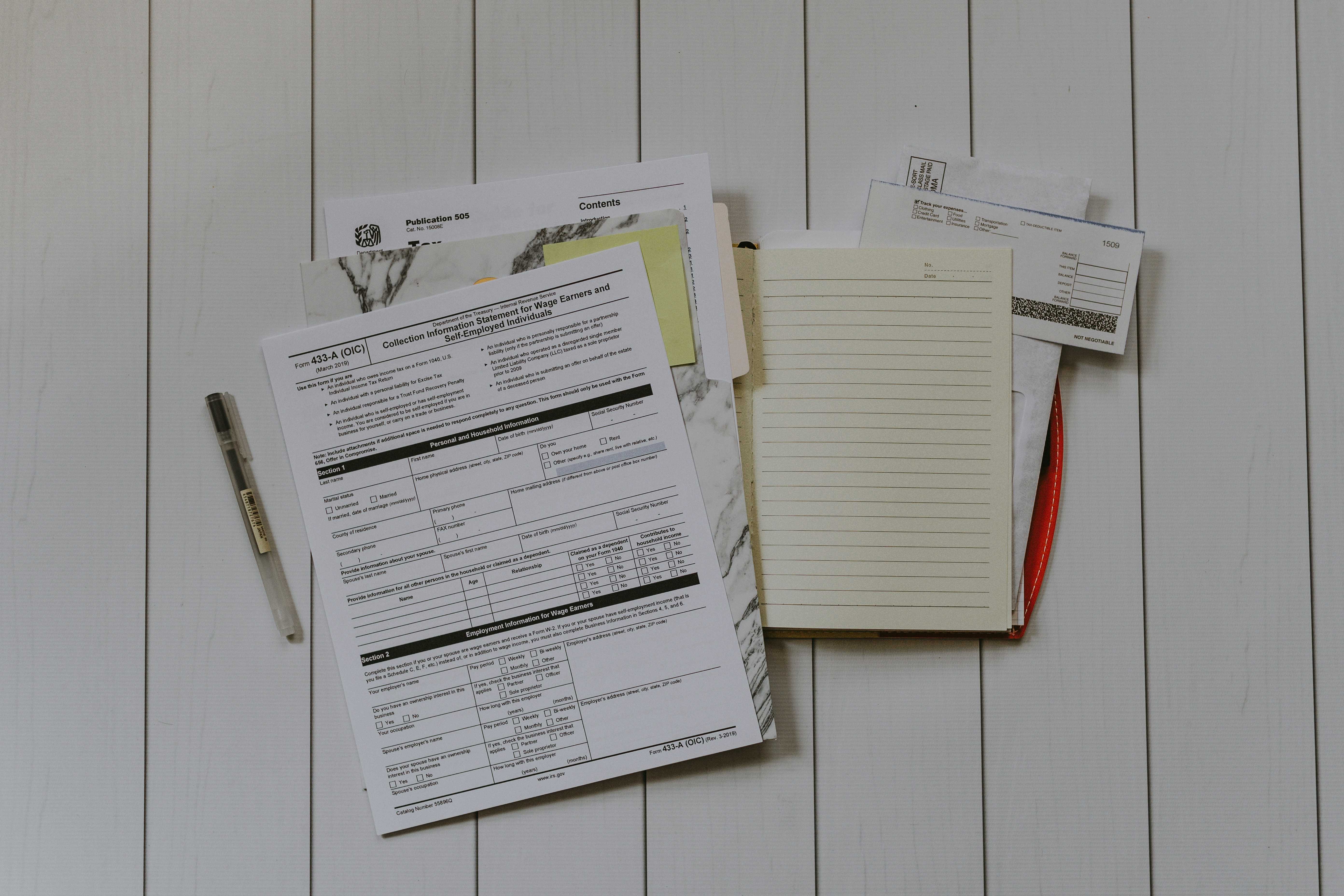 Financial and tax documents in a folder
