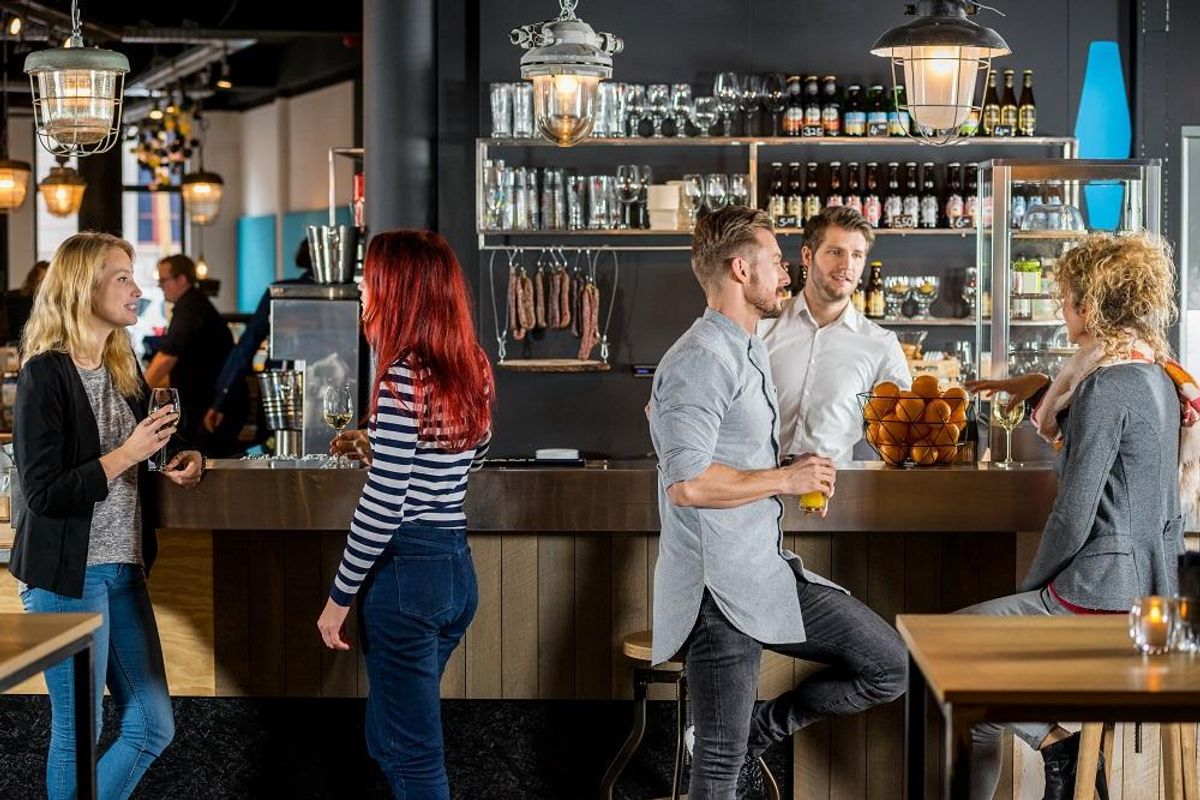 Friends having drinks at bar