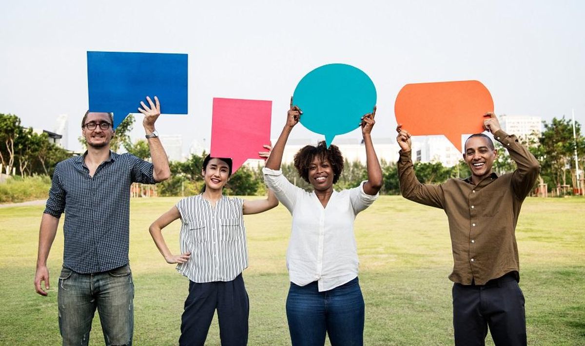 friends holding speech bubbles