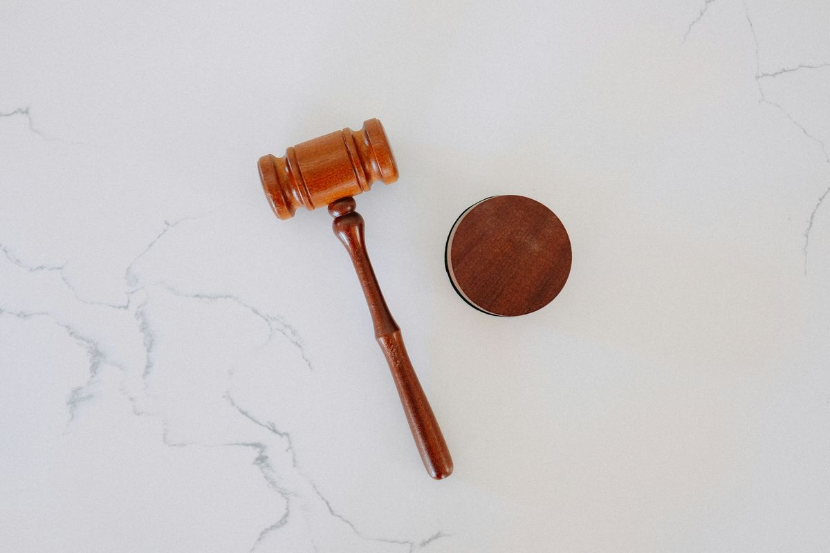 Gavel symbolizing suing for non-payment