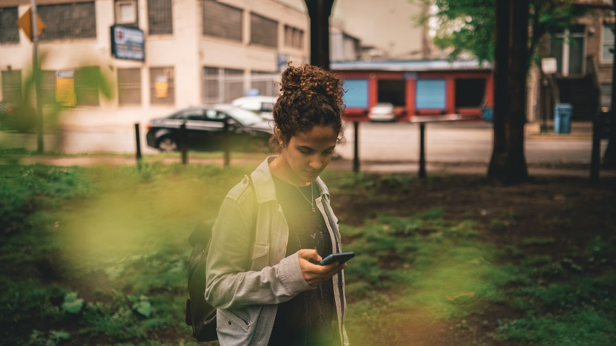 Gen Z looking at brand marketing on phone