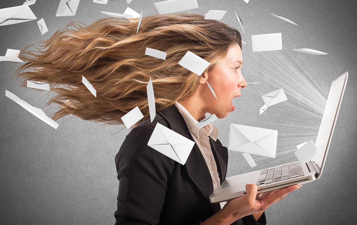Girl covered with a wind of email