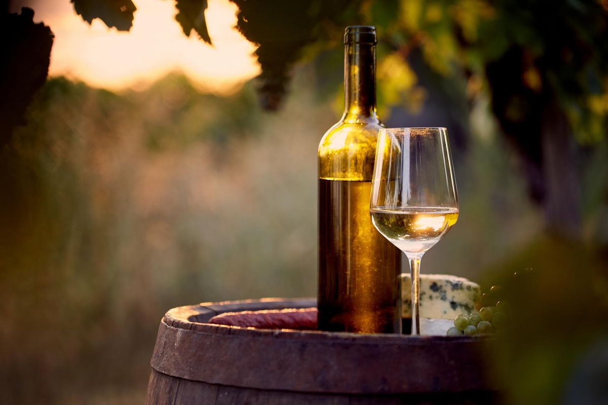 Glass and bottle of white wine