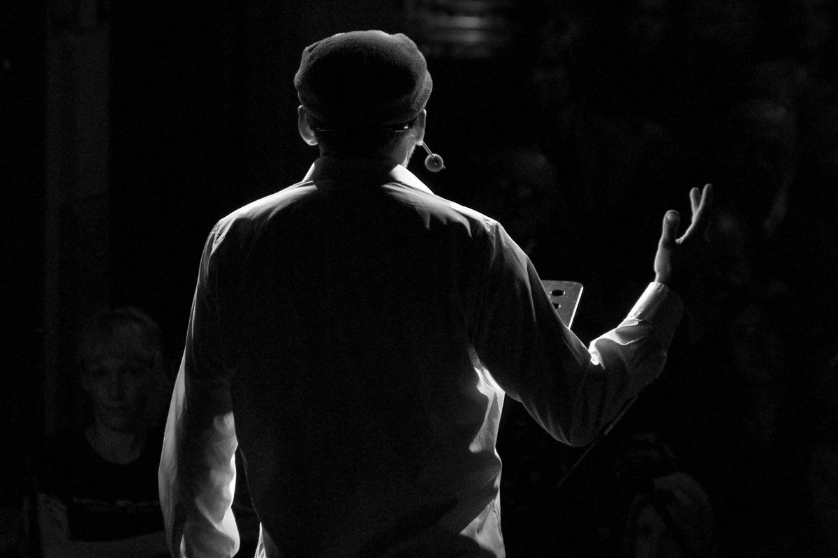 grayscale of man in dress shirt