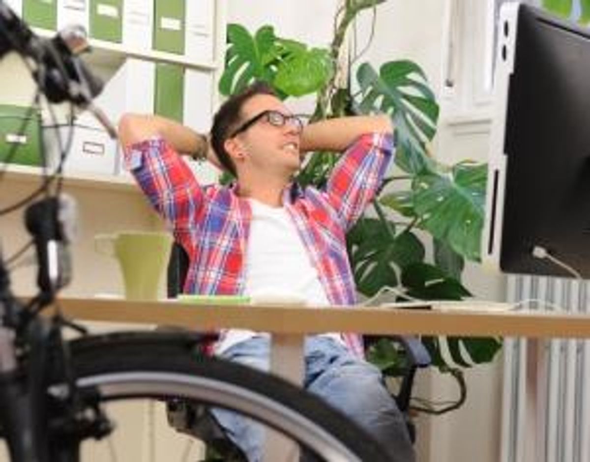 green office: businessman with bicycle at office
