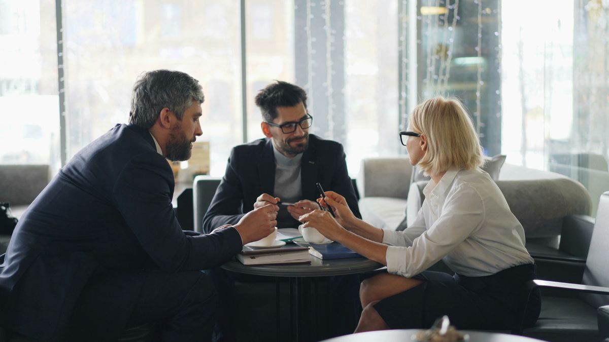 Group of managers meeting about organizational structure