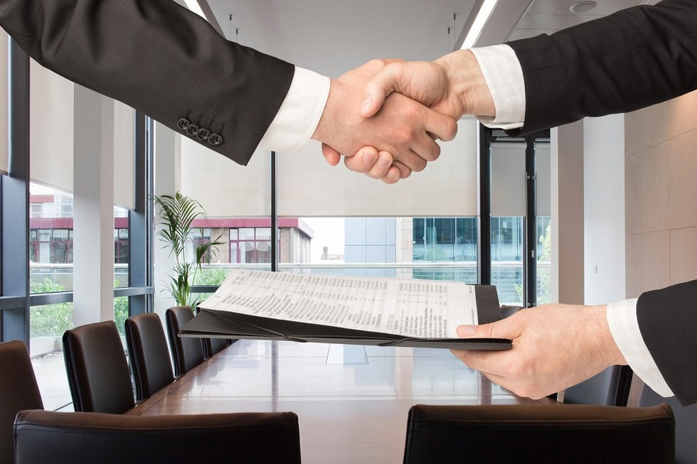 Handshake after selling a business