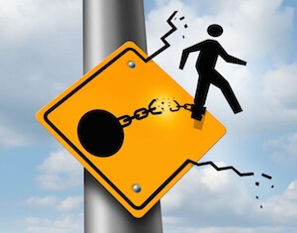 image of man in sign breaking free to pursue new career