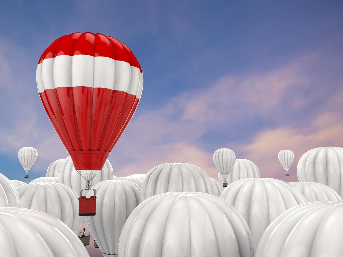 leadership concept with red hot air balloon