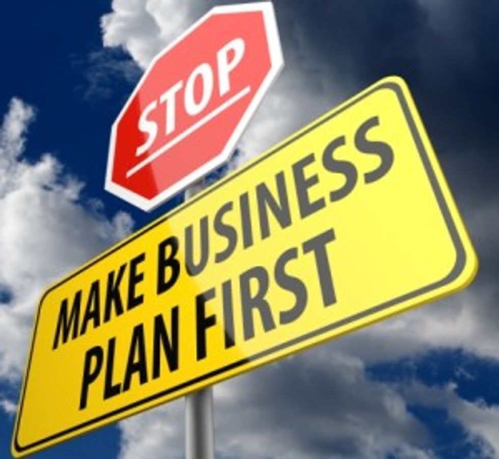 Make Business Plan First words on Road Sign and Stop Sign