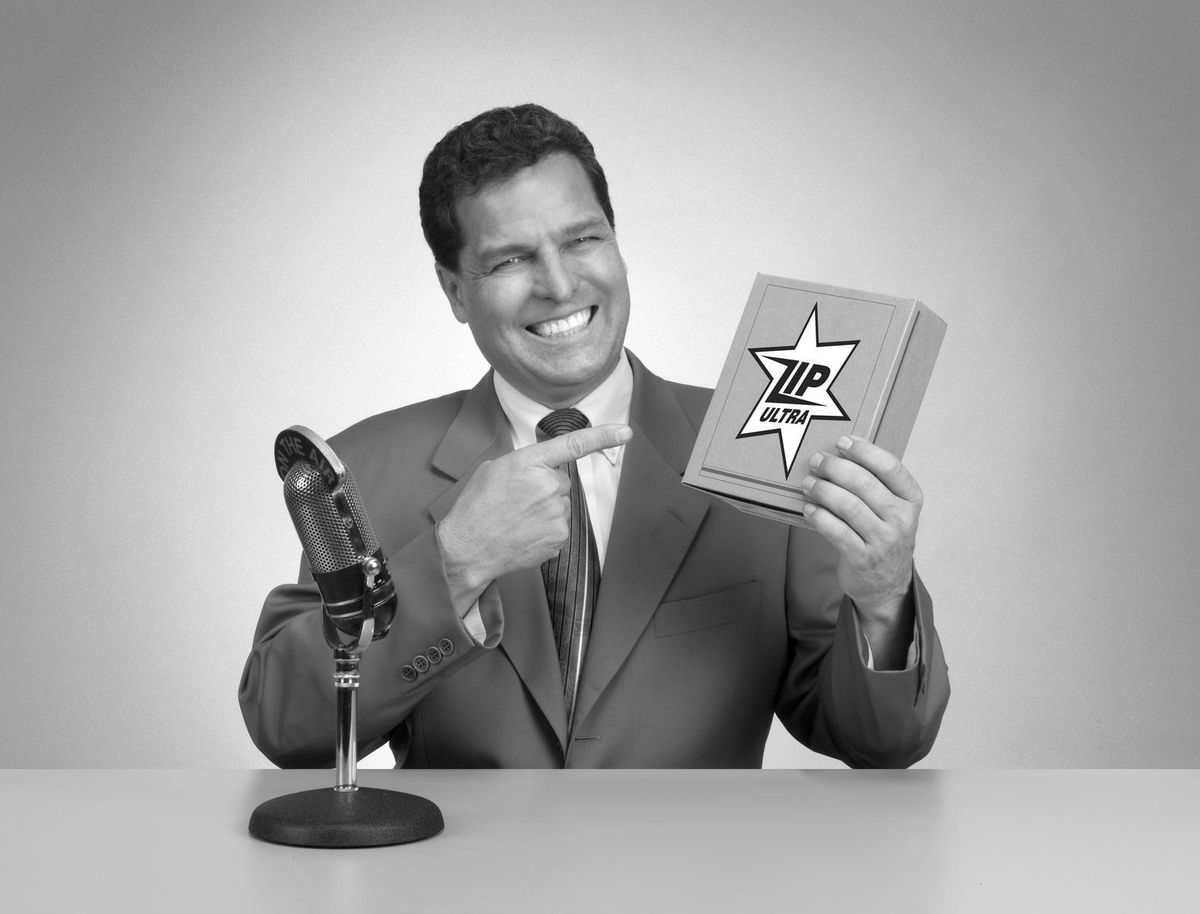 Man advertising a product on television