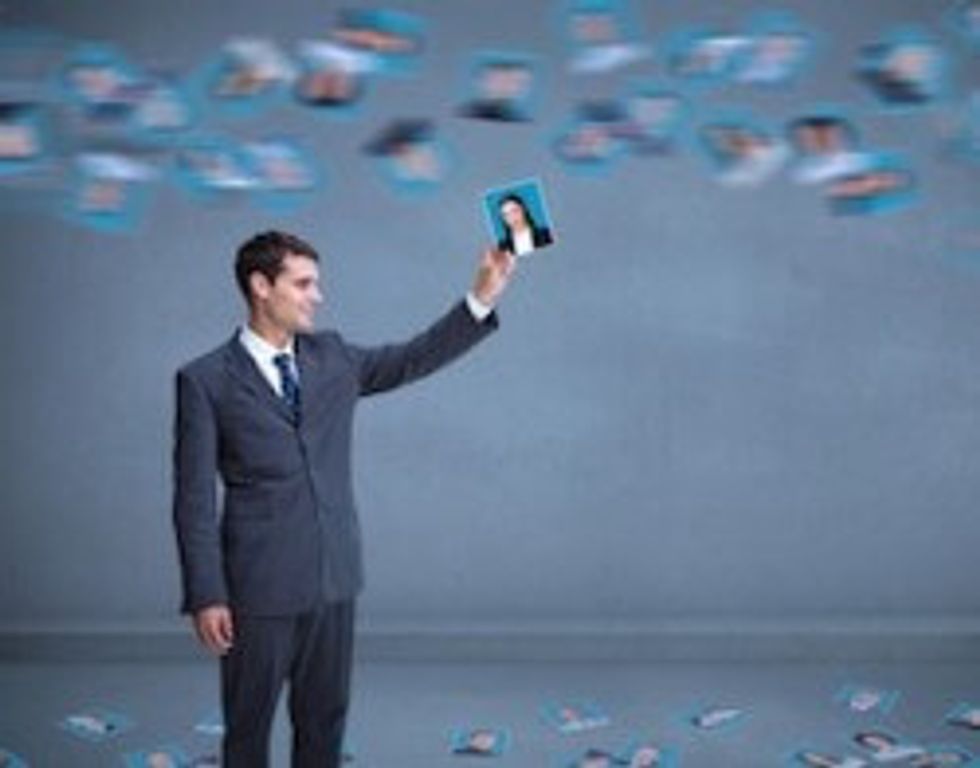 man choosing images of employees