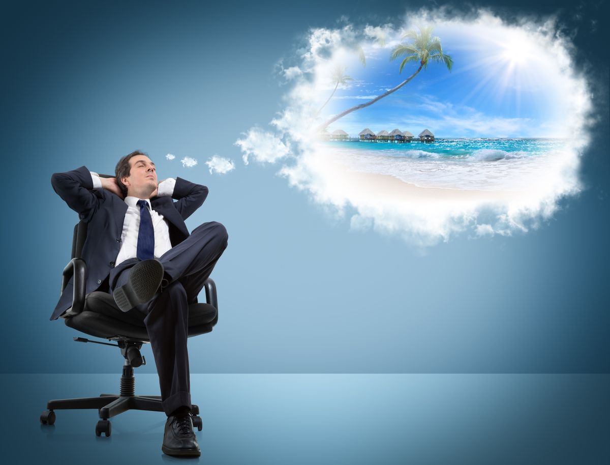 Man dreaming of his vacation after returning to work