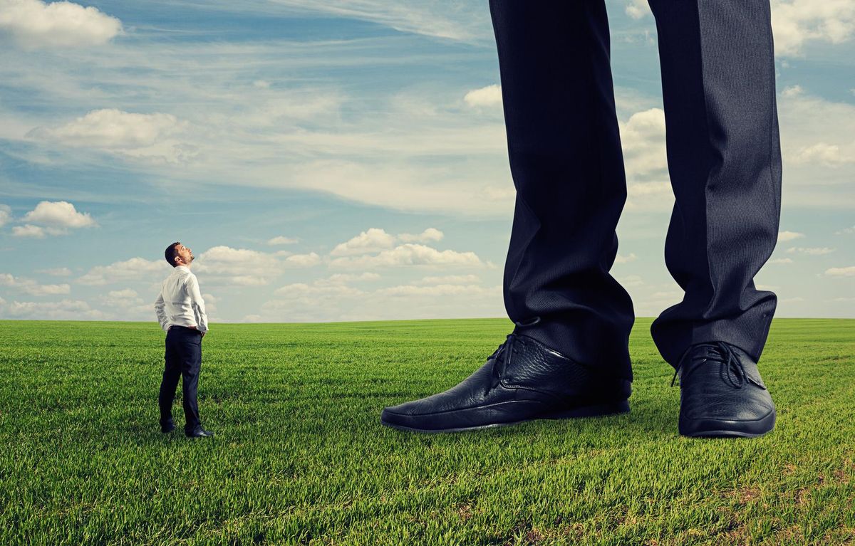 man looking at his big boss