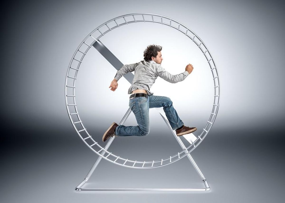 man on hamster wheel