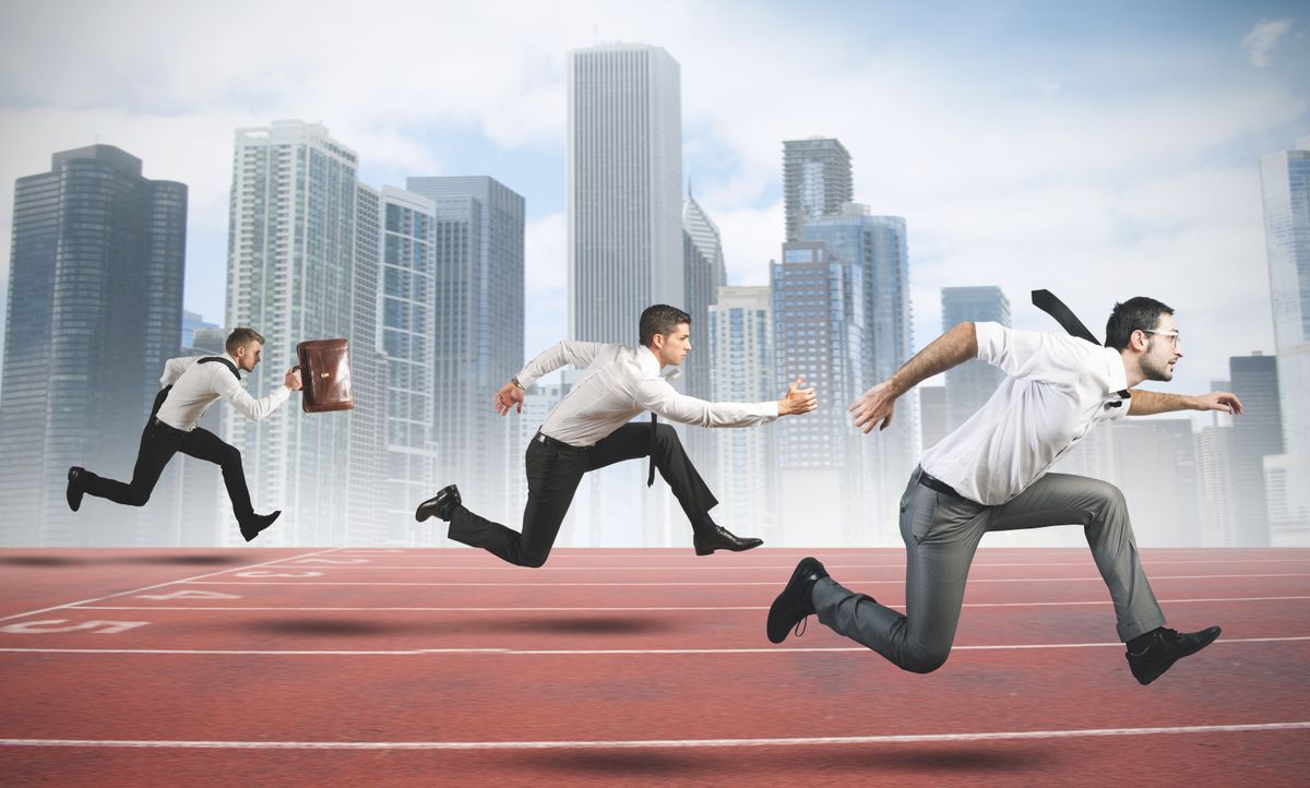 Man running to get ahead in business
