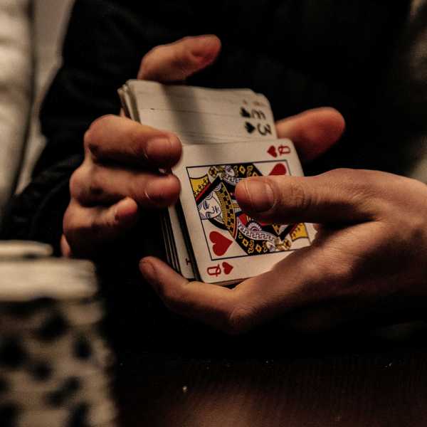Man shuffling cards at the World Series of Poker