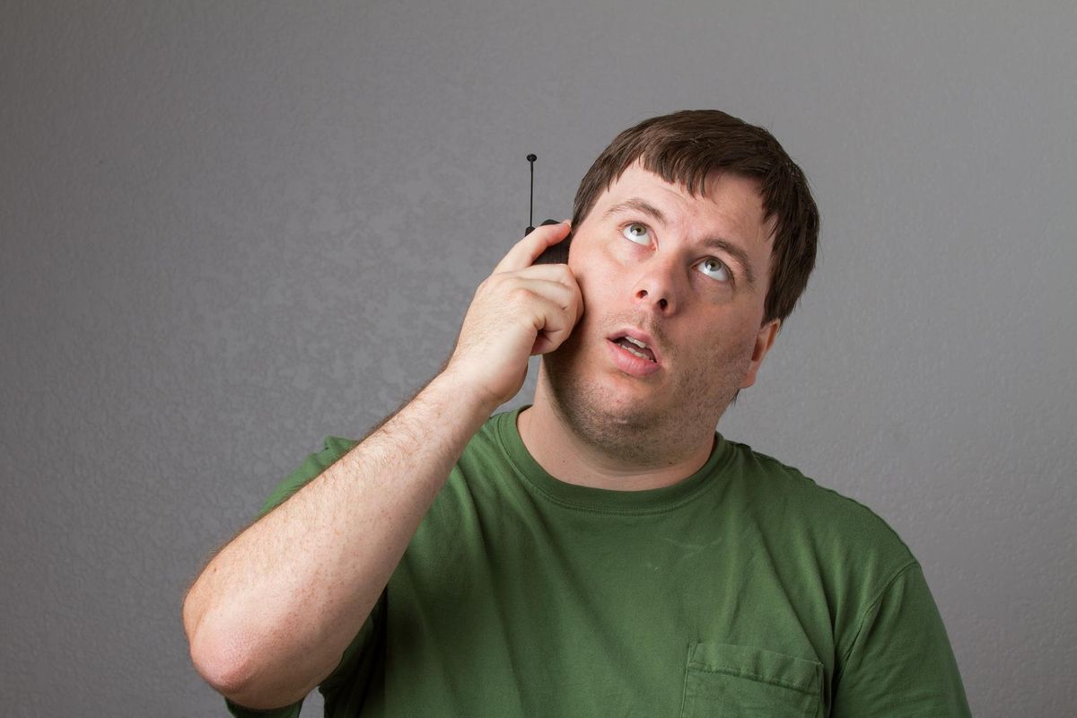 man waiting on the phone