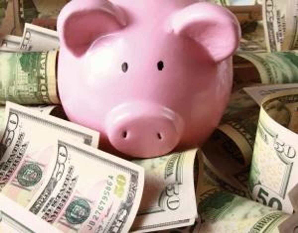 Piggy bank on dollars