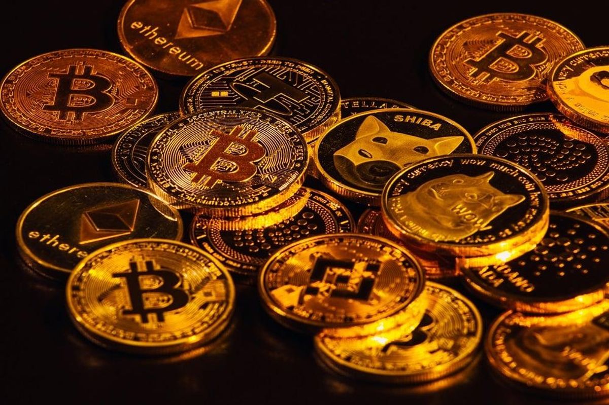 Pile of cryptocurrencies over dark background