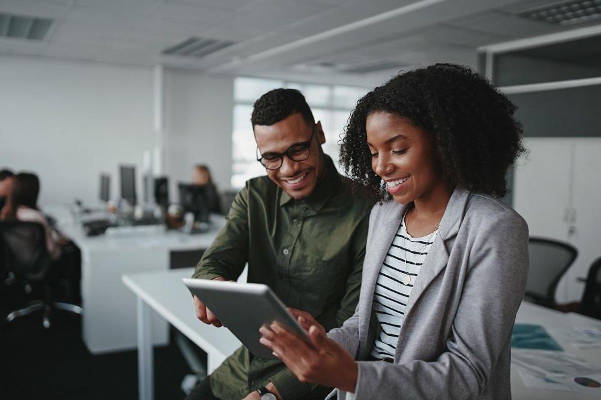 professional businessman and businesswoman together working