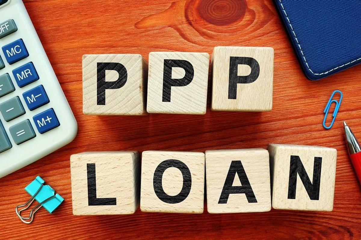 Protection Program PPP Loan on wooden cubes