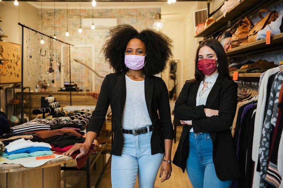 retail employees with face masks