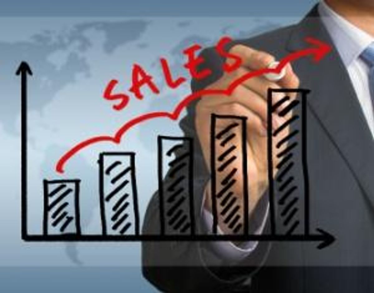 sales graph hand drawing by businessman