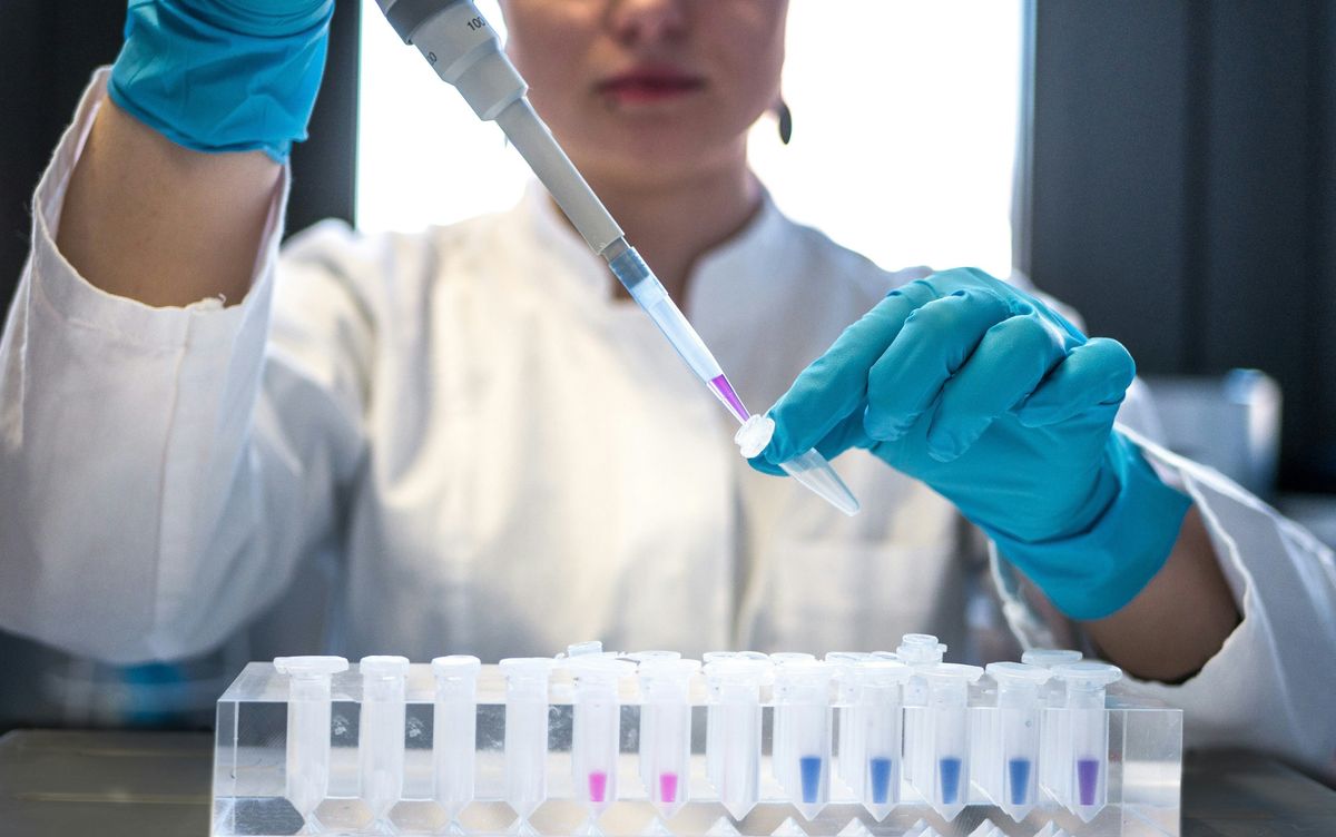 Scientist working on AI-led advances in a lab