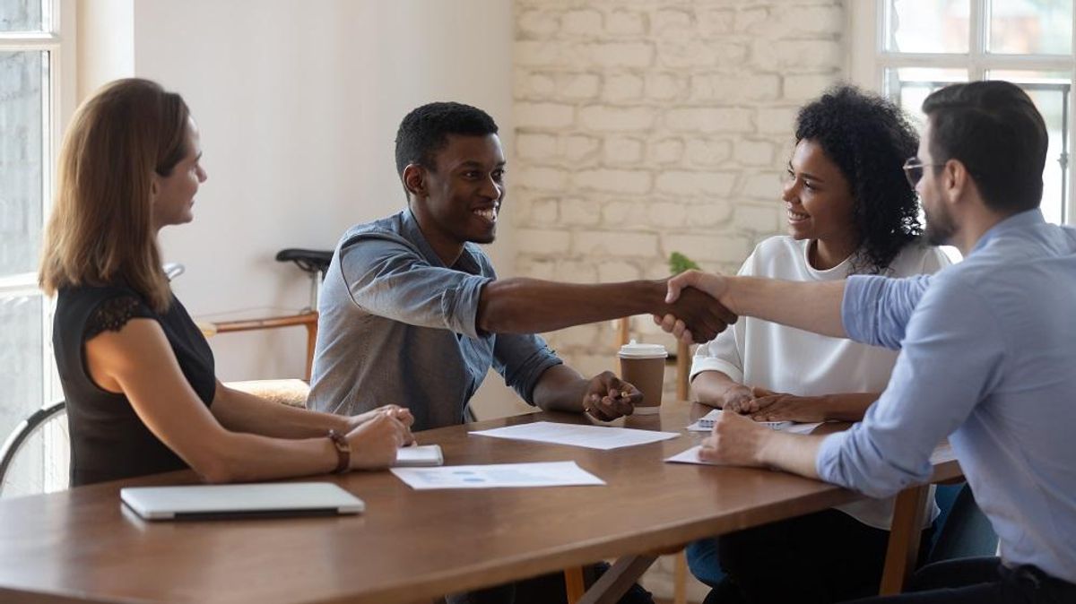 Shaking hands after successful EEOC mediation